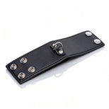 Black 2-inch ball stretcher laid flat with snap closure, stitched edges, and attached silver D-ring on white background