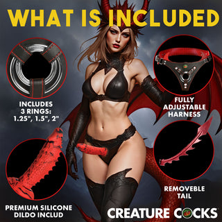 A central model in black lingerie and red wings, plus four circular inset callouts showing included items: 3 rings, an adjustable harness, a removeable tail, and a premium silicone dildo. Brand text 'CREATURE COCKS' appears at the bottom.