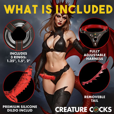 A central model in black lingerie and red wings, plus four circular inset callouts showing included items: 3 rings, an adjustable harness, a removeable tail, and a premium silicone dildo. Brand text 'CREATURE COCKS' appears at the bottom.