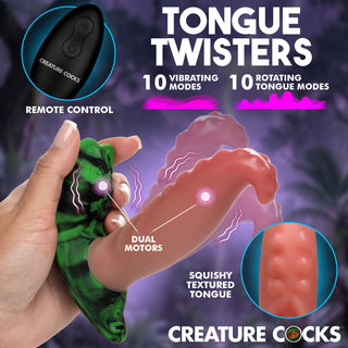 Promotional graphic for Creature Cocks Tongue Twisters, showing a hand holding a green marbled silicone tongue-shaped toy, with text highlighting 10 vibrating modes, 10 rotating tongue modes, remote control, dual motors, and a textured tongue detail on a purple background.