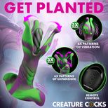Promotional graphic for a sexually explicit novelty product, showing a green and purple silicone hand with text overlays reading 'GET PLANTED', '3X SPEEDS', '6X PATTERNS OF VIBRATION', '6X PATTERNS OF EXPANSION', 'REMOTE CONTROL', and 'CREATURE COCKS'.