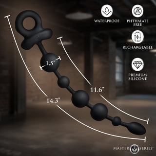 Black silicone butt plug with dimension markings (1.5 inches, 11.