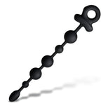 Black silicone beaded anal plug with a ring handle, shown diagonally on a white background with a soft shadow.