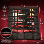 A black roll-up tool organizer laid open on a dark red fabric background, showing multiple compartments with red and silver tools. White measurement lines indicate 33.