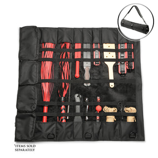 A black roll-up tool organizer pouch laid flat on a white background, filled with various hand tools such as red-handled implements, rope, and straps. A circular inset at the top right shows the pouch rolled up with a strap attached.