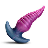 A spiral-shaped anal butt plug with a glittery finish, featuring a blue base that transitions into a pink and purple spiral tip, shown on a white background with a soft shadow.
