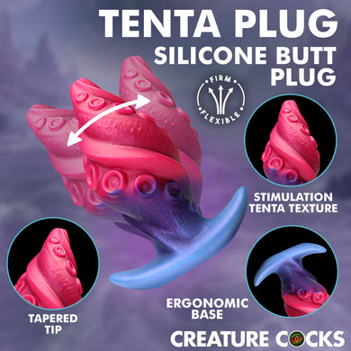 A promotional graphic for a silicone butt plug labeled 'TENTA PLUG' with the text 'Silicone Butt Plug.' The main product is shown as a pink and blue curved plug with suction-cup texture, plus three circular inset close-ups and callout labels including 'Firm & Flexible,' 'Stimulation Tenta Texture,' 'Tapered Tip,' 'Ergonomic Base,' and 'Creature Cocks.