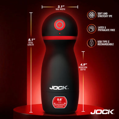 Jock male masturbator device in matte black with red accents, shown on a dark red background with dimension callouts and feature icons. The device has the Jock brand name printed on it.