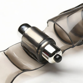 Close-up of the removable bullet vibrator housed within the smoke gray finger glove sleeve for targeted stimulation