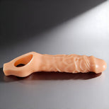 Realistic cock sheath featuring detailed veining and stretchable opening for secure comfortable wear
