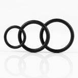 Black triple cock ring set featuring three flexible rings in different diameters for customizable fit, support, and enhanced performance.