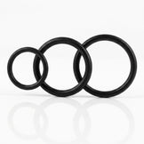 Black triple cock ring set featuring three flexible rings in different diameters for customizable fit, support, and enhanced performance.