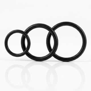 Black triple cock ring set featuring three flexible rings in different diameters for customizable fit, support, and enhanced performance.