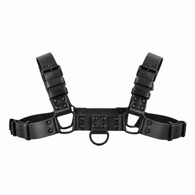 Blackout Bulldog chest harness on white, black vinyl straps with blacked-out buckles and front D-ring
