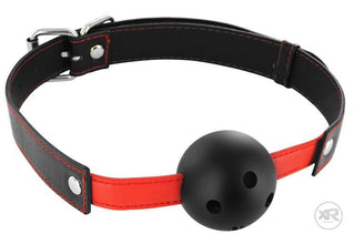 Breathable bondage ball gag laid flat showing the 1.75 inch ball and adjustable strap