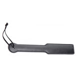 Small PU leather paddle and flogger from the 6-piece bondage kit for impact play