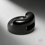 The Cock Holster Cock and Ball Ring in black, sleek molded design with integrated support and smooth finish for comfortable fit