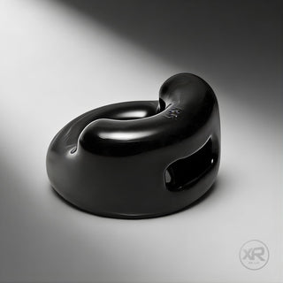 The Cock Holster Cock and Ball Ring in black, sleek molded design with integrated support and smooth finish for comfortable fit