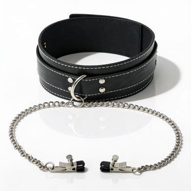 Black faux leather bondage collar with attached silver chain and adjustable nipple clamps displayed on a white background