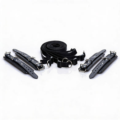 Complete deluxe bed restraint kit with four padded cuffs and adjustable black under-bed restraint straps