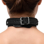 Close-up of the padded leather collar on the Female Chest Harness featuring an adjustable buckle, textured finish, and durable metal hardware.