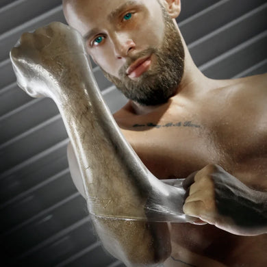 Bearded model holding up an arm sheathed in the FFister Frost fisting sleeve