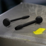 Cum Plug silicone penis plugs 2 pack laid on a steel surface, Fort Troff
