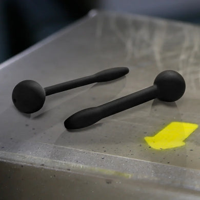 Cum Plug silicone penis plugs 2 pack laid on a steel surface, Fort Troff