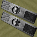 Leather Ankle Cuffs pair laid flat with D-rings and Velcro closures, olive background, Fort Troff