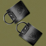 Leather Ankle Cuffs restraints close-up of embossed Fort Troff shield and riveted D-ring