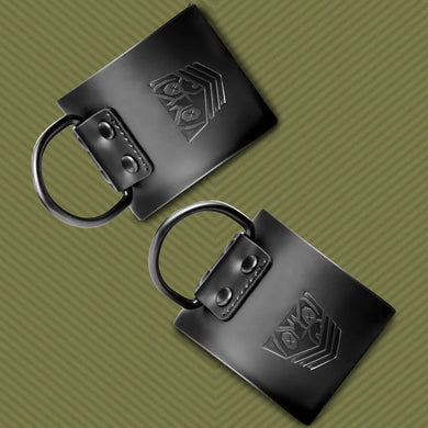 Leather Ankle Cuffs restraints close-up of embossed Fort Troff shield and riveted D-ring