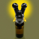 Pig Snout X installed on an essential oil bottle