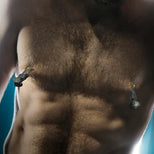 Captive Grip stainless steel nipple clamps on both nipples of a hairy, bearded model, Fort Troff