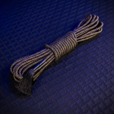 Grunt Rope 30 ft bondage rope coiled and bundled, olive-black braided polyester with tassel end