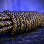 Grunt Rope braided polyester bondage rope macro detail of the olive-black weave