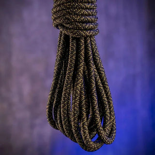 Grunt Rope 30 ft bondage rope hanging in a loose coil
