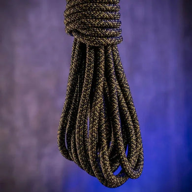 Grunt Rope 30 ft bondage rope hanging in a loose coil