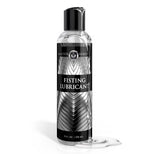 Master Series fisting lubricant bottle with clear water based lubricant spill on white background