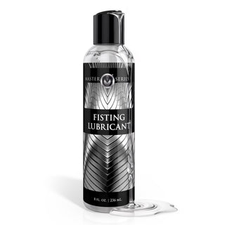 Master Series fisting lubricant bottle with clear water based lubricant spill on white background