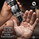 Bottle of Master Series product being applied to a hand with text about exploring anal fantasies.