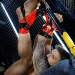 Mega-Roll bondage tape wrapped around cock and balls and legs, close-up