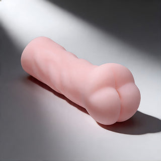 Realistic soft masturbator sleeve with sculpted curves and lifelike outer design for enhanced grip and control