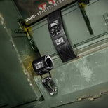 Neo Wrist Restraints pair with carabiner on an ammo can