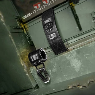 Neo Wrist Restraints pair with carabiner on an ammo can
