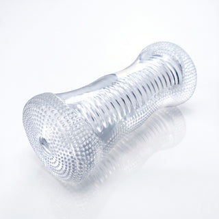 Front view of the Palm-Tec DX17 Clear Stroker displaying its textured entry opening and transparent flexible sleeve construction
