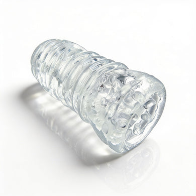 Angled view of the Palm-Tec LX20 Intense Stroker highlighting the transparent material, ribbed outer texture, and ergonomic handheld shape