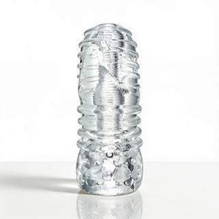 Palm-Tec LX20 Intense Stroker standing upright with a clear flexible sleeve, raised exterior rings, and textured stimulation chamber