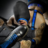Perforated bondage hood worn, showing fit around the head