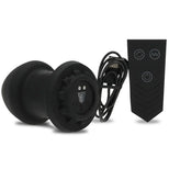 Robo Rimmer plug on its side with wireless remote and USB charging cable