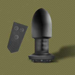 Robo Rimmer Slim vibrating plug upright next to its wireless remote